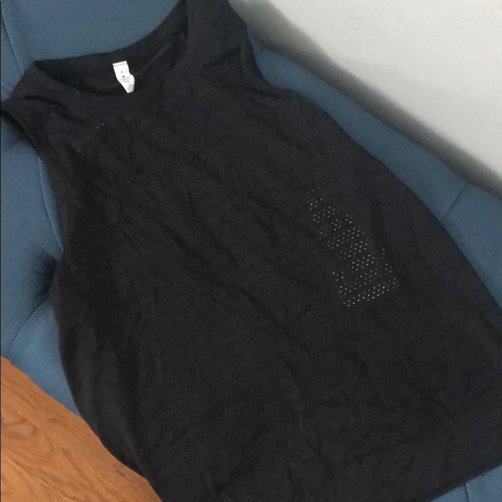 Lululemon breeze by muscle tank. Only worn a couple times. In great condition